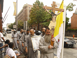 Friars deliver message of love on Baltimore streets