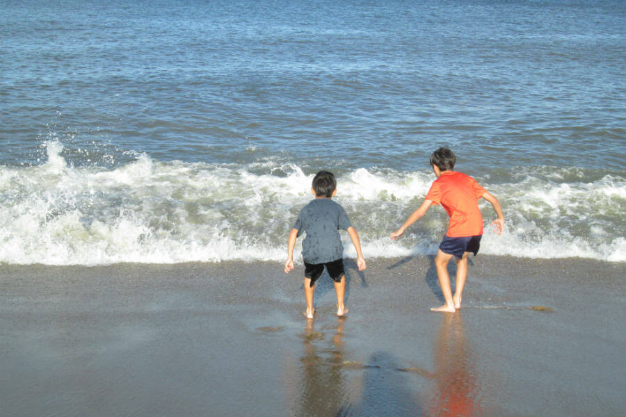 Stepping into the ocean and our beach vacation