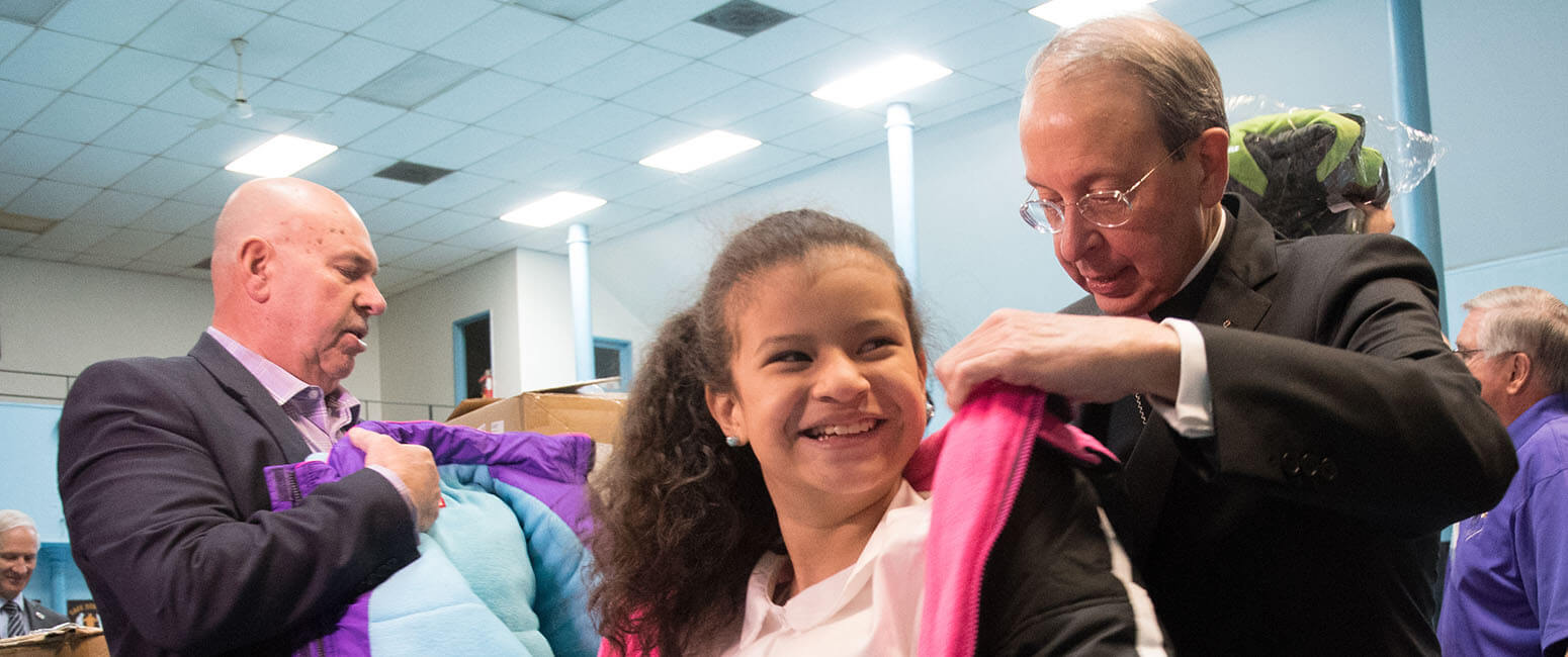 Knights of Columbus warm Baltimore students with 1,000 coats