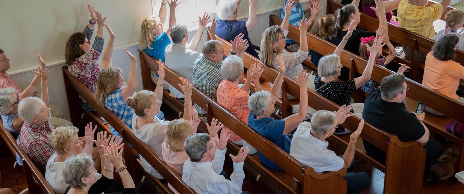 Deaf community enjoys Mass with Archbishop Lori and deaf priest