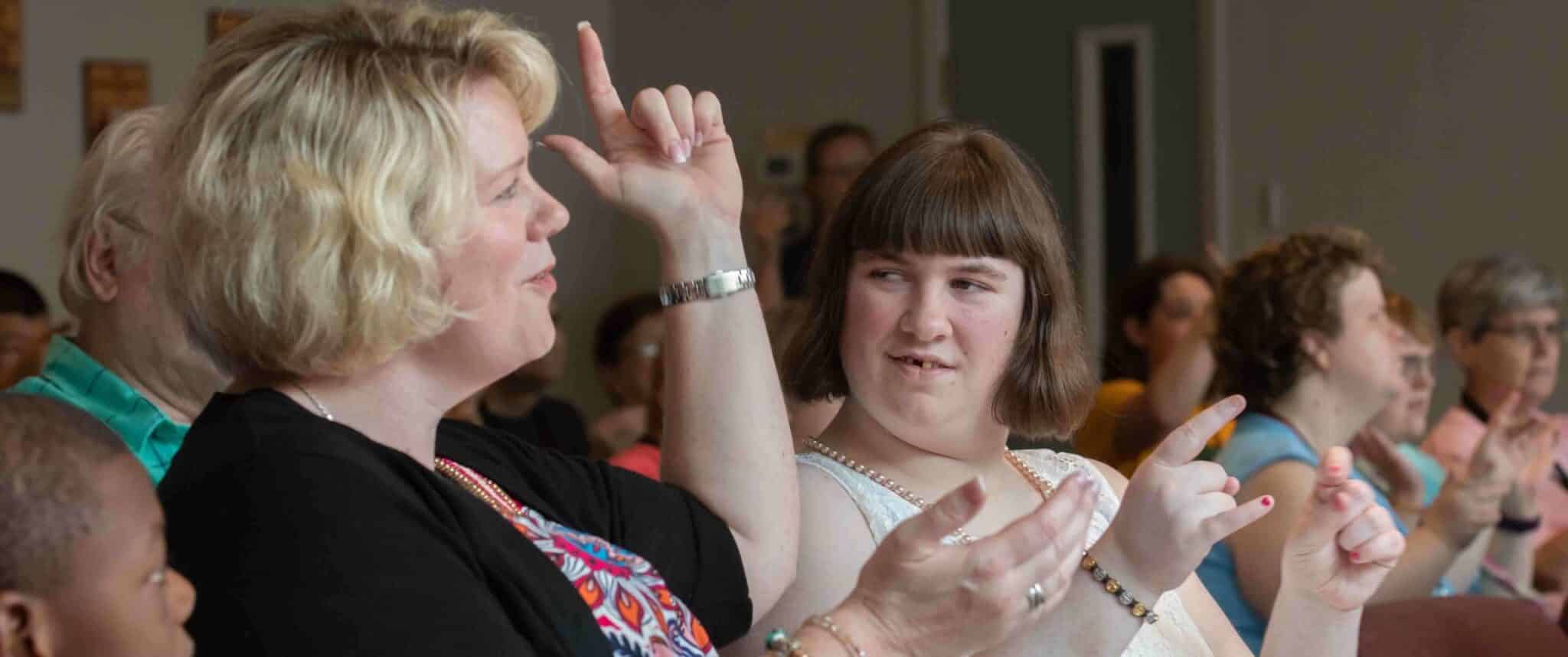St. Agnes parishioner receives first Communion at Camp GLOW
