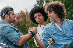 Sacha Baron Cohen (right) stars as Abbie Hoffman in The Trail of the Chicago 7.