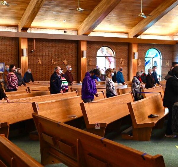 In-person Masses continue amid surge in coronavirus cases