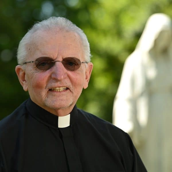 Father Frank Brauer, the quiet force that binds St. Francis Xavier together, prepares to say goodbye