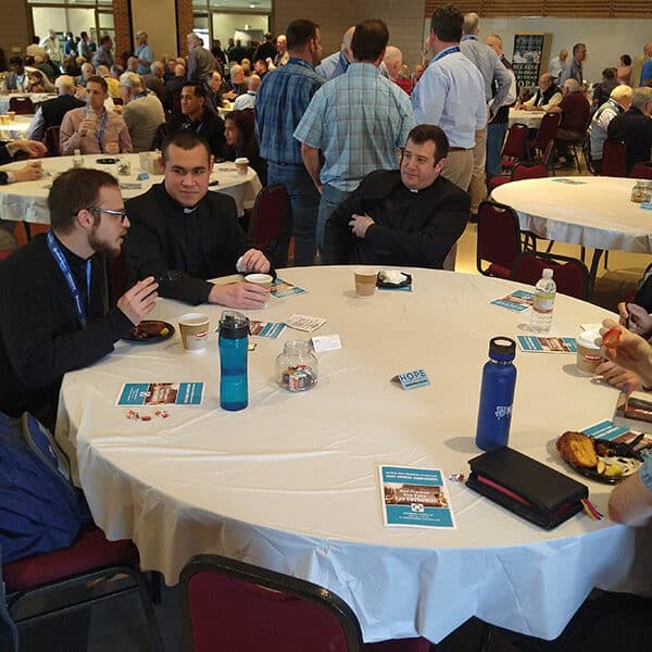 Men’s conference centers on Eucharist
