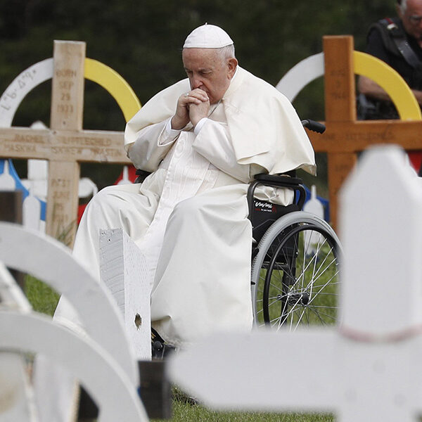 Returning moccasins, pope apologizes for church role in residential schools