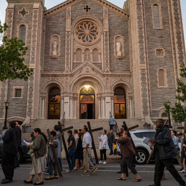 Hispanic immigrants voice their struggles as they pray on the streets of Highlandtown
