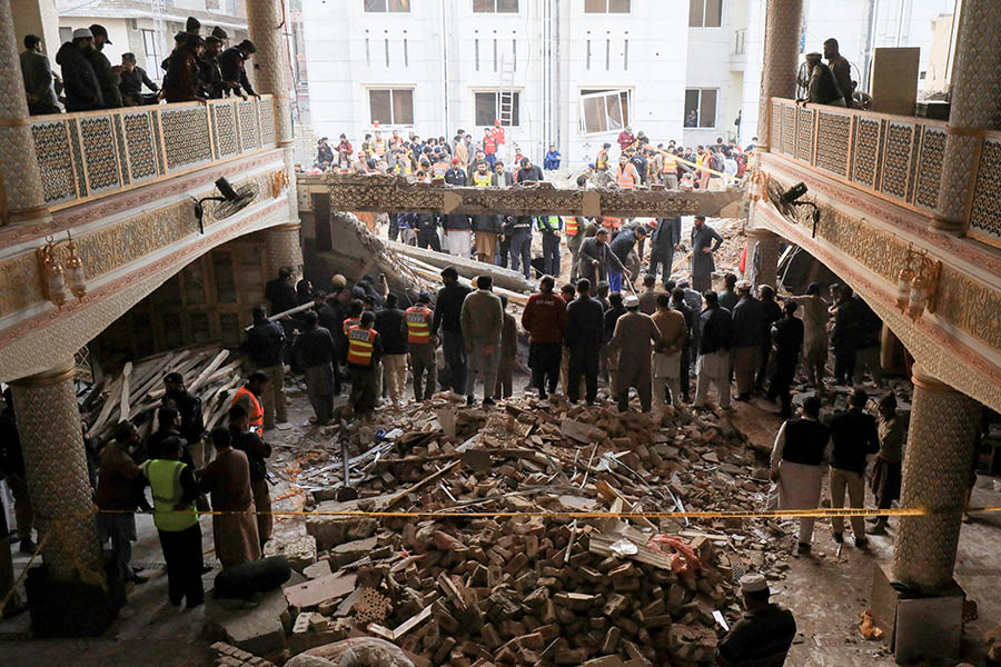 Mosque suicide bombing targets police, dozens dead
