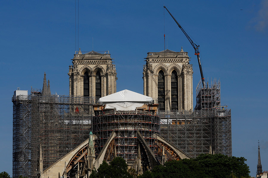 Notre Dame Cathedral reopening date announced as reconstruction on its famous spire wraps up in eastern France