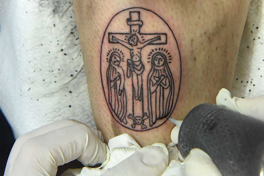 Question Corner: A priest with grandchildren and a question on tattoos - Catholic Review