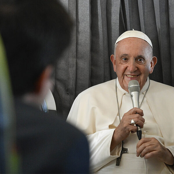 On flight to Rome, pope responds to questions about abuse, his health