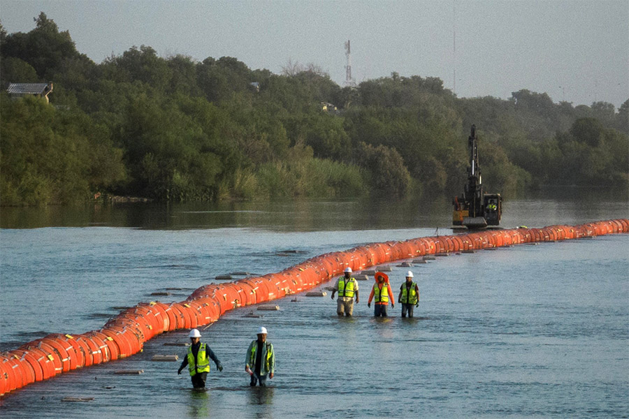 Justice Department tells Texas that floating barrier on Rio Grande