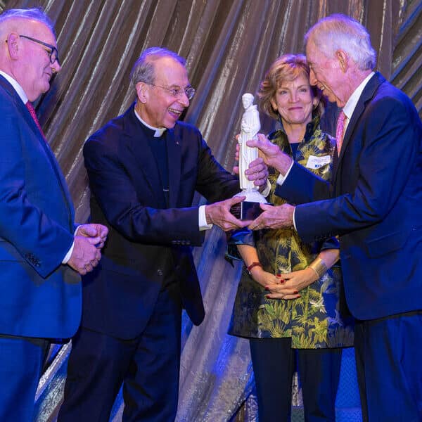 Hope and Promise: Catholic Charities marks centennial, honors long-time director