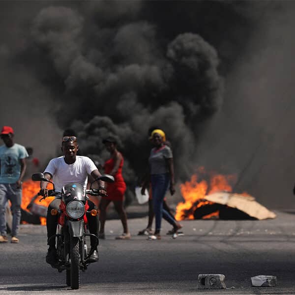 As Haiti descends into more chaos, priests vow to stay and minister to the people