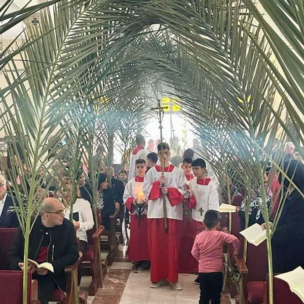 ‘We are not alone, abandoned or afraid,’ patriarch of Jerusalem says on Palm Sunday