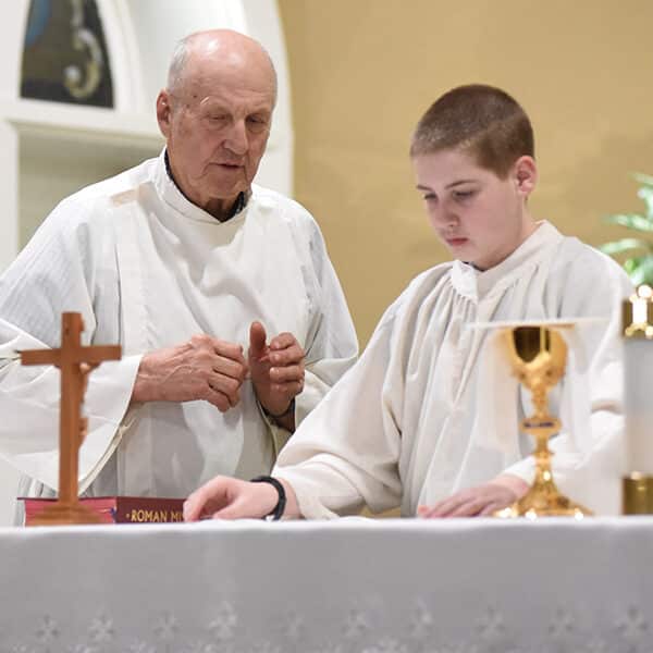 78-year-old altar server passes on love of Eucharist to younger generation