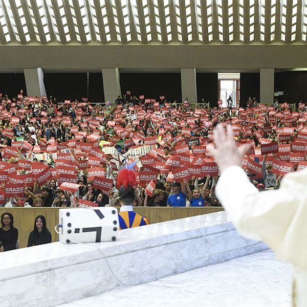 A better world can’t be built ‘lying on the couch,’ pope tells children