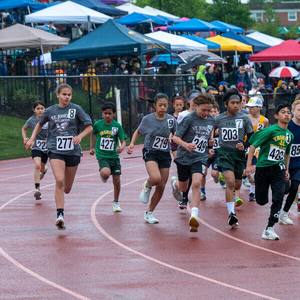 Archdiocese of Baltimore Youth Bowl competitors run with bright spirit despite damp conditions