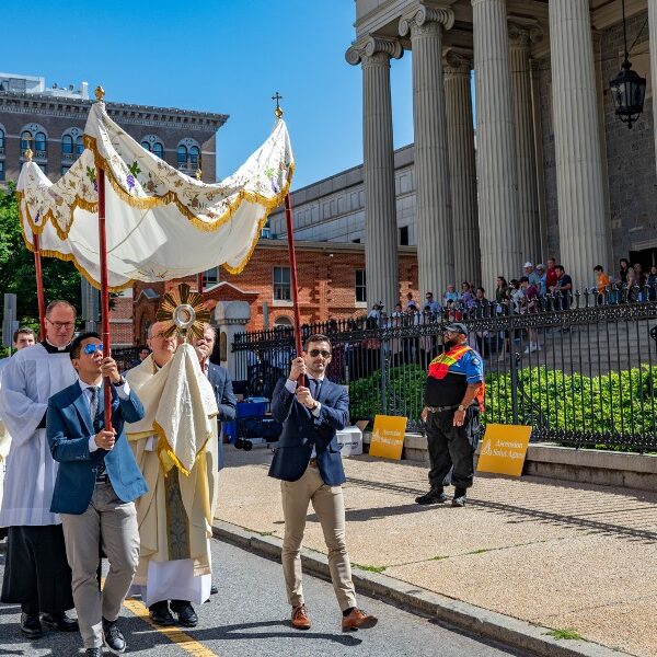 ‘He’s truly there:’ Hundreds of pilgrims process with Eucharist through Baltimore streets