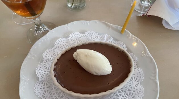 Plate of chocolate mousse on a doily