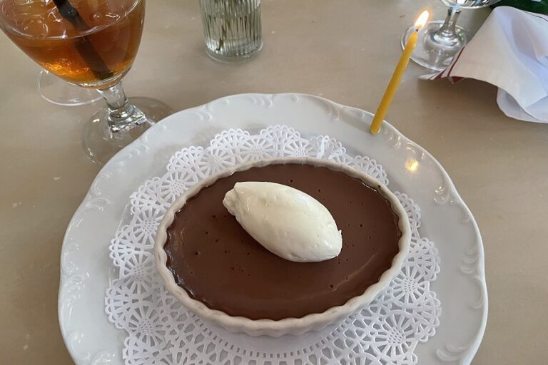 Plate of chocolate mousse on a doily