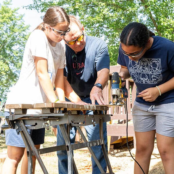 Catholic summer camps help youths meet Jesus serving others struggling under poverty