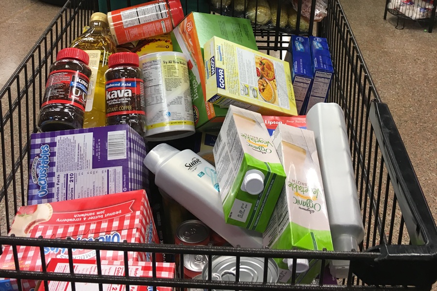 A shopping cart full of groceries