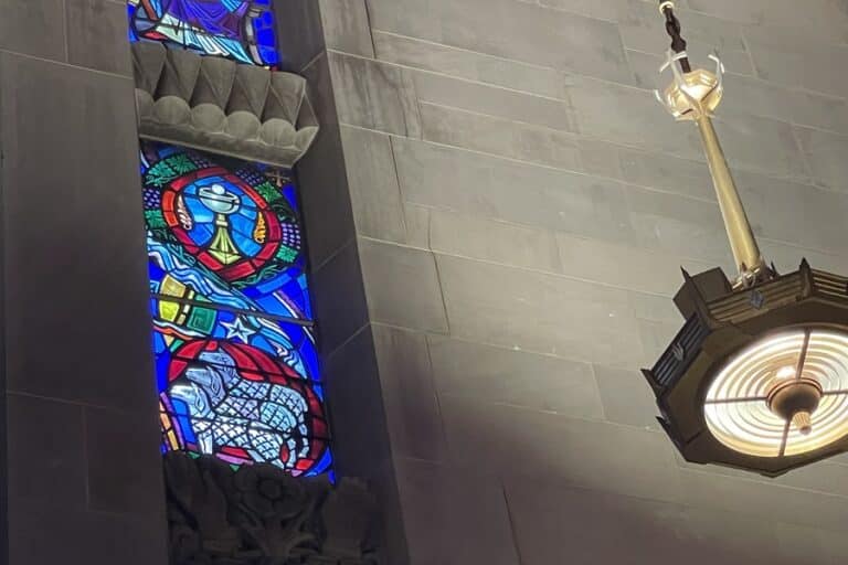 Stained glass image showing the Eucharist
