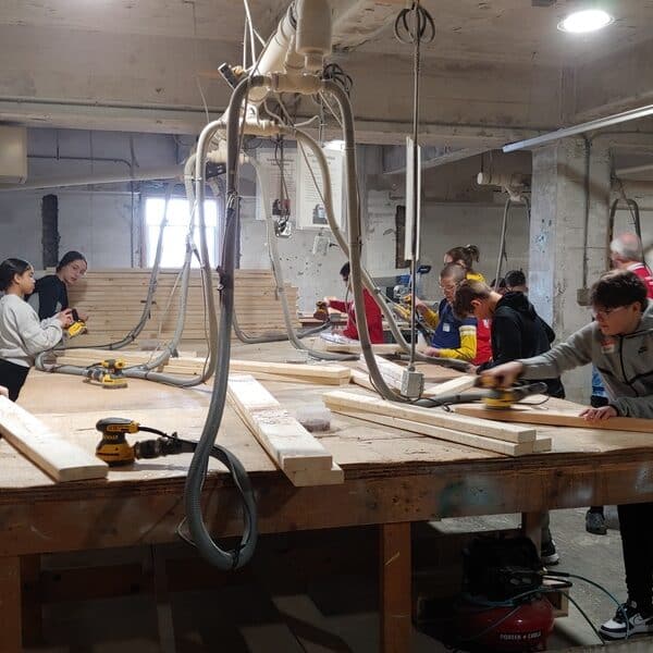 Building beds, building faith: Youths participate in day of service and mercy