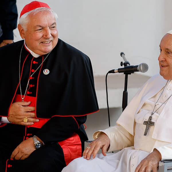 Warm, welcoming, French cardinal works with migrants, Mediterranean