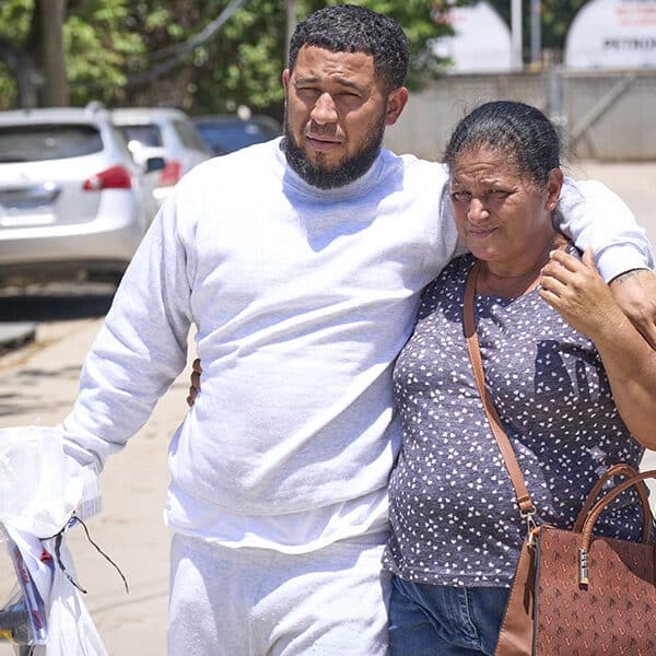 Church workers welcome deported migrants to Honduras