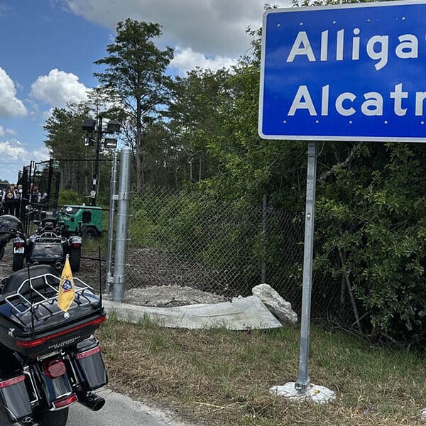 Archbishop Wenski leads Knights on Bikes to pray rosary at Alligator Alcatraz