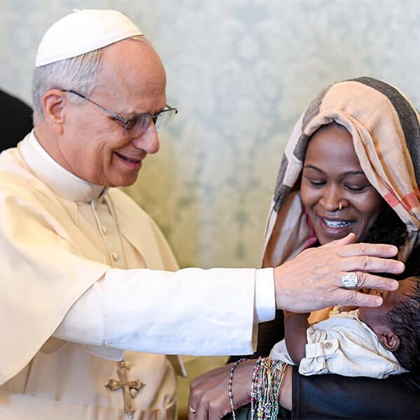 Pope defends rights of refugees evicted to build U.S. military base