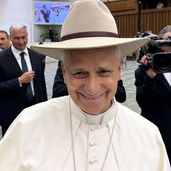 Sydney couple raise the roof with Pope Leo hat trick