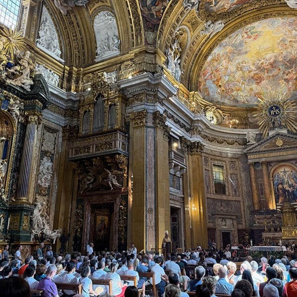LGBTQ Catholics process through Holy Door at St. Peter’s