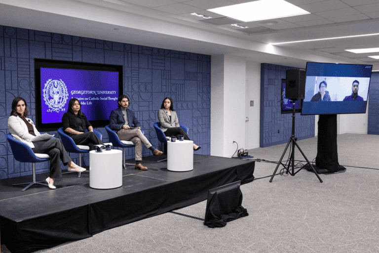 Paula Fitzgerald, Roxana Rueda Moreno, moderator Christian Soenen, and Rosa Reyes attend an in-person and live-streamed Latino leader gathering on 