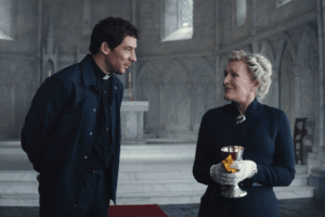 Josh O'Connor and Glenn Close star in a scene from the movie. "Wake Up Dead Man: A Knives Out Mystery."