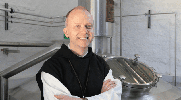 Then-Father Erik Varden, abbot of Mount St. Bernard Abbey, poses in the brewery