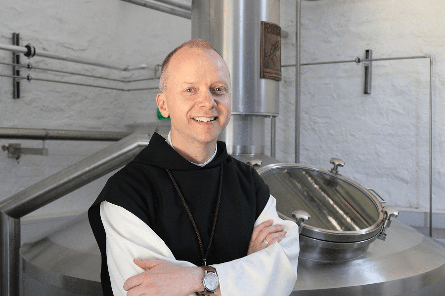 Then-Father Erik Varden, abbot of Mount St. Bernard Abbey, poses in the brewery