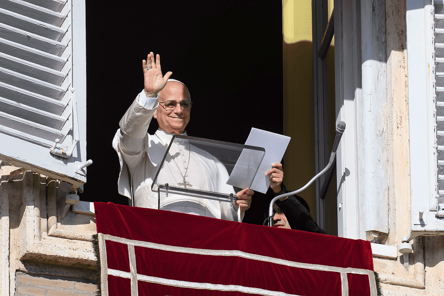 Pope Leo XIV waves to visitors gathered in St. Peter's Square