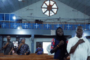 Worshippers attend an evening Mass