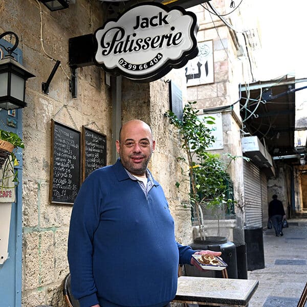 Inviting pilgrims back is more than business, it’s family history, Holy Land shop owners say