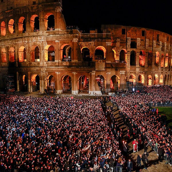 At Colosseum, pope carries the cross, leading thousands in Good Friday prayer for suffering world