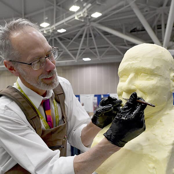 Minnesota butter sculptor brings skills to NCEA convention, enshrines pope in the dairy staple
