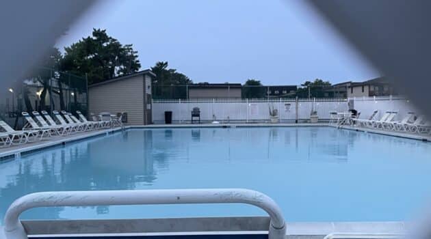 View of a pool through a fence