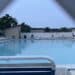View of a pool through a fence