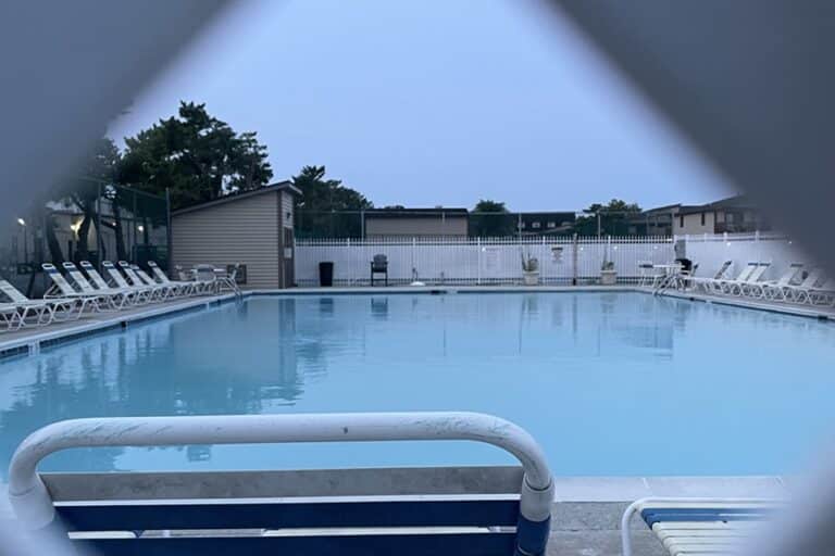 View of a pool through a fence